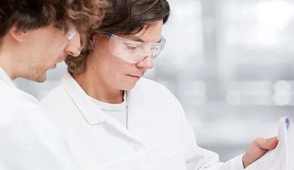 Two lab workers